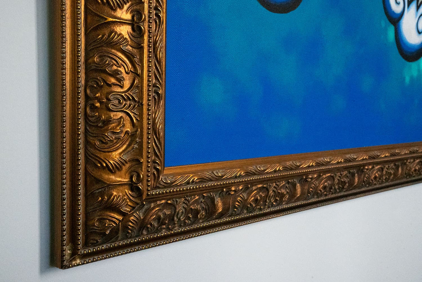 Close up shot of gold frame for Red Dragon Original Painting.