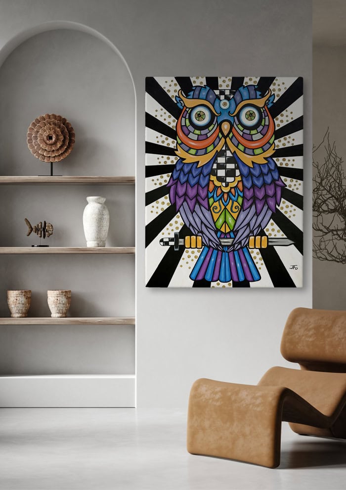 Original Owl painting hung on wall above chair.