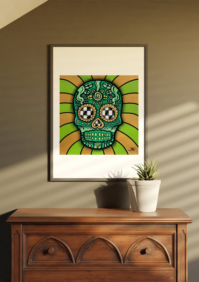 Green Sugar Skull print framed and hung on wall above dresser.