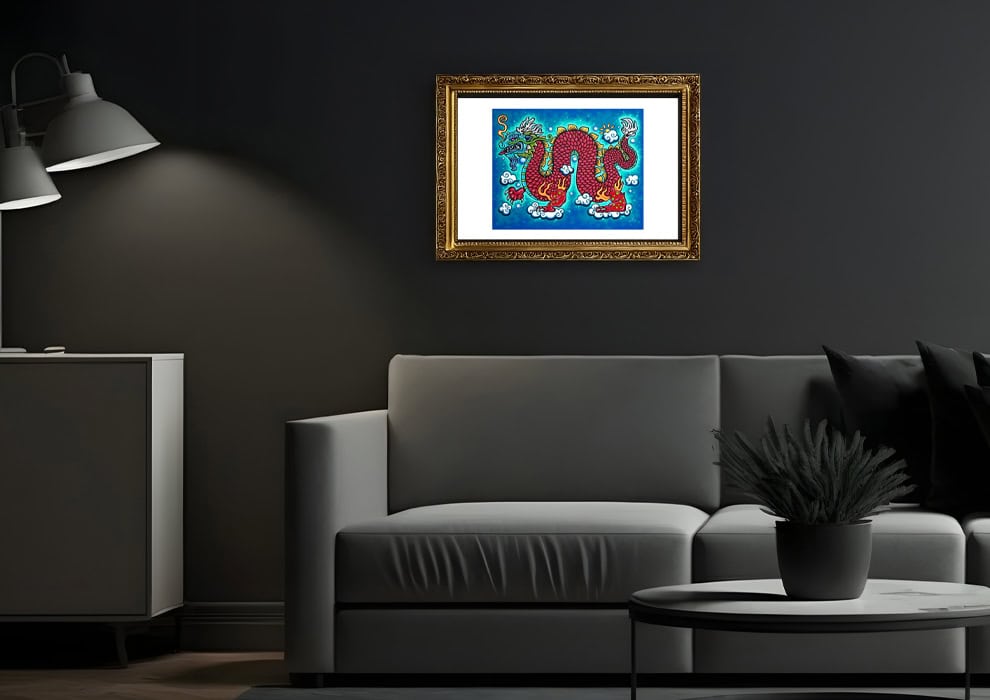 Red Dragon print in gold frame and hung on wall above couch.