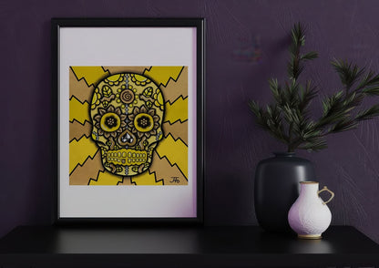 Yellow Sugar Skull framed and sitting on shelf next to decor.