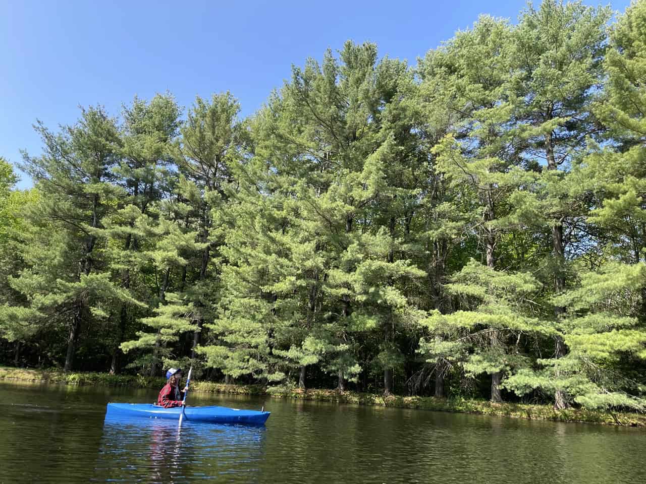 JFo kayaking on a body of water.